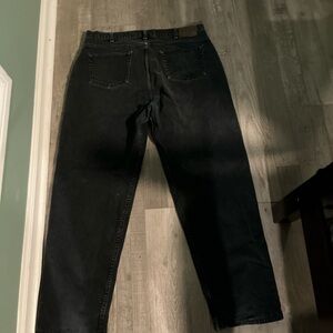 i’m selling a 38 sized pair of jeans they are black and in pretty good condition